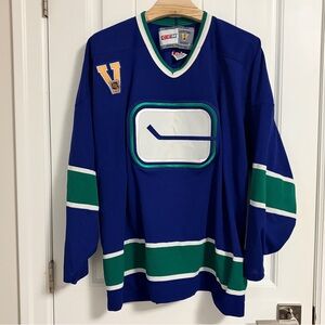 Authentic CCM Vancouver Canucks Stick In Rink Blue Jersey Size XXL 2XL